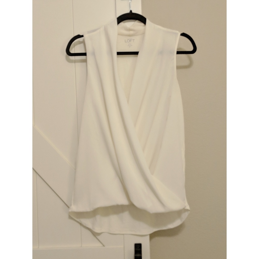 White sleeveless blouse